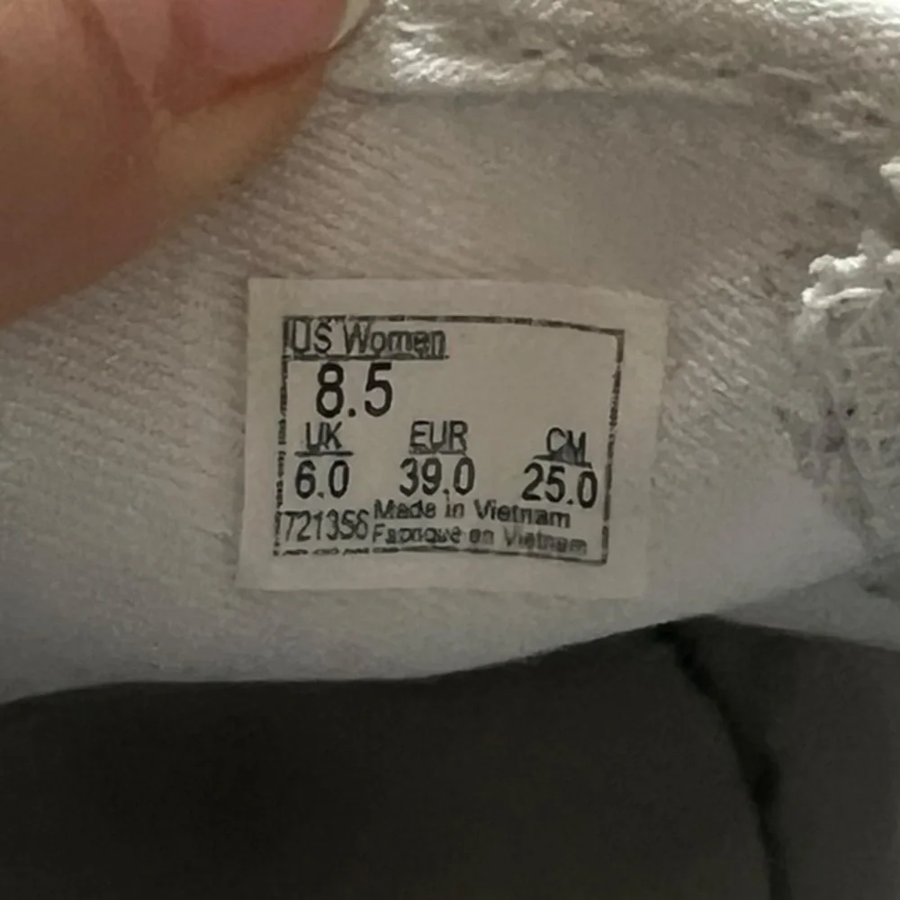 Vans Women's Classic White Slip On Sneakers